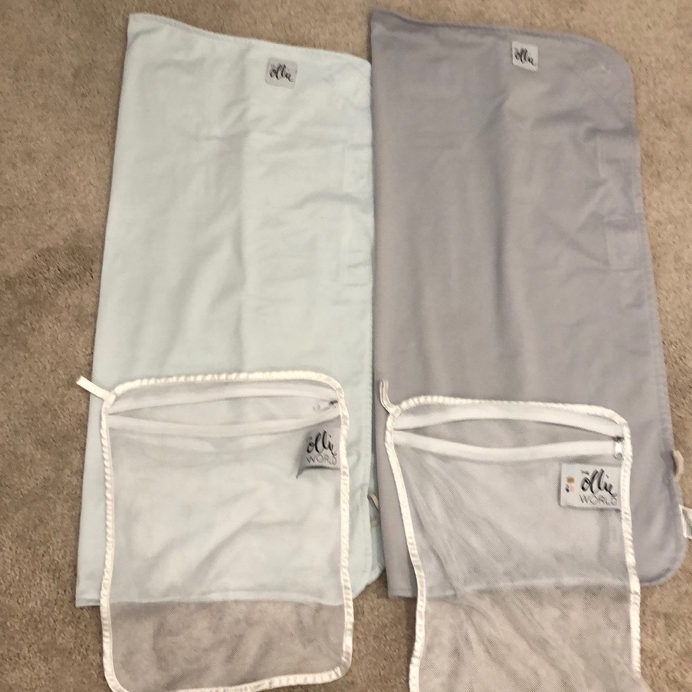 Ollie swaddles, stone and sky. Gently used.